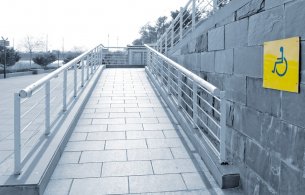 Wheelchair access ramp with signage Wheelchair access ramp with signage