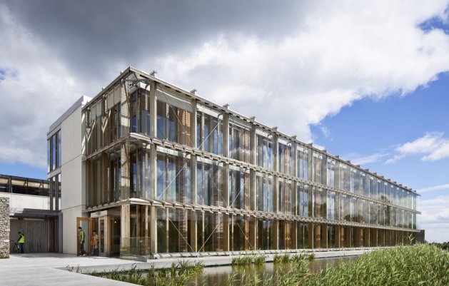 Administration building view of south facade and pond, Ballyogan Operations Centre, DLR Architects