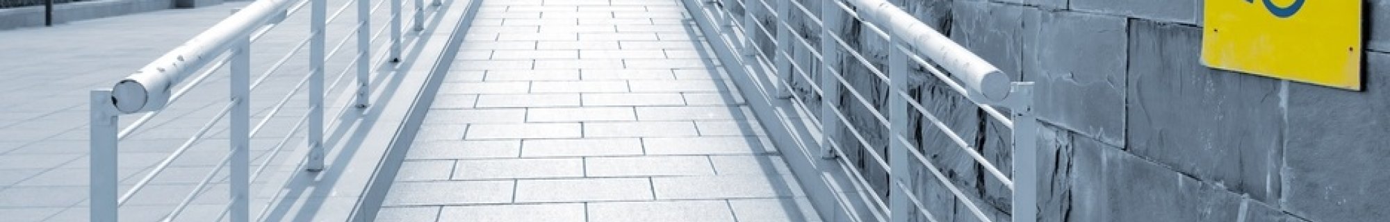 Wheelchair access ramp with signage