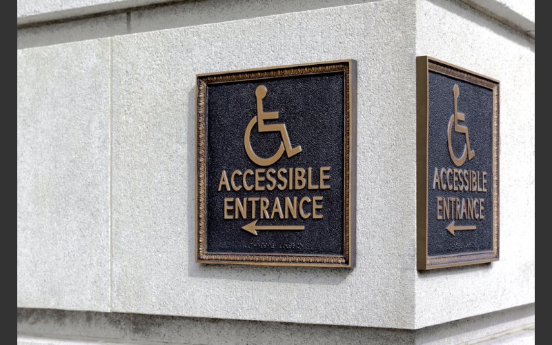 Accessible entrance sign