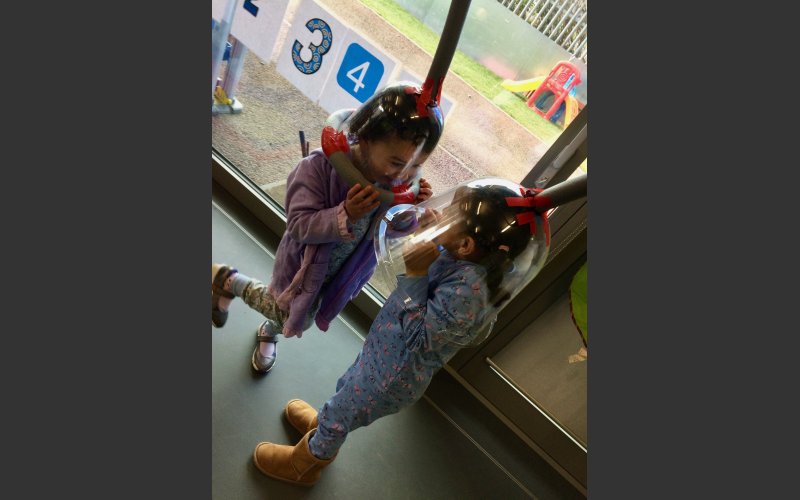 Listening Pods by Helen Barry Children listening to sounds