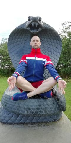Author Paul Donnelly in a yoga pose