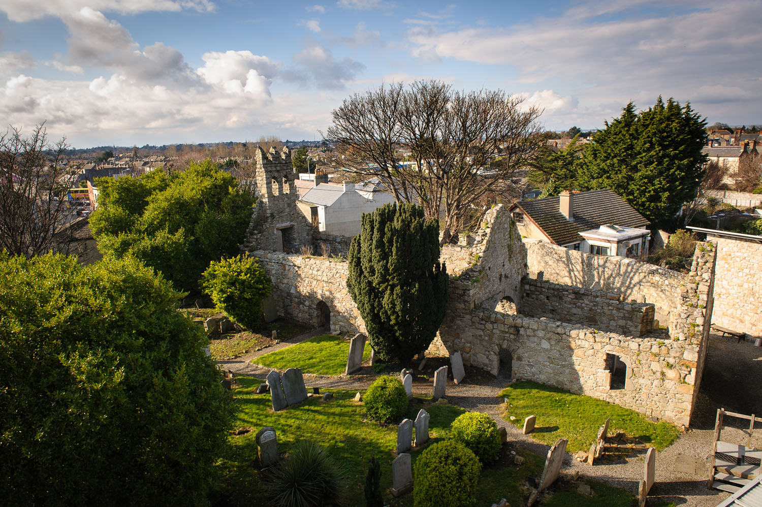 arial view of the ruins of St. Begnet's Church in Dalkey with the graveyard in the foreground