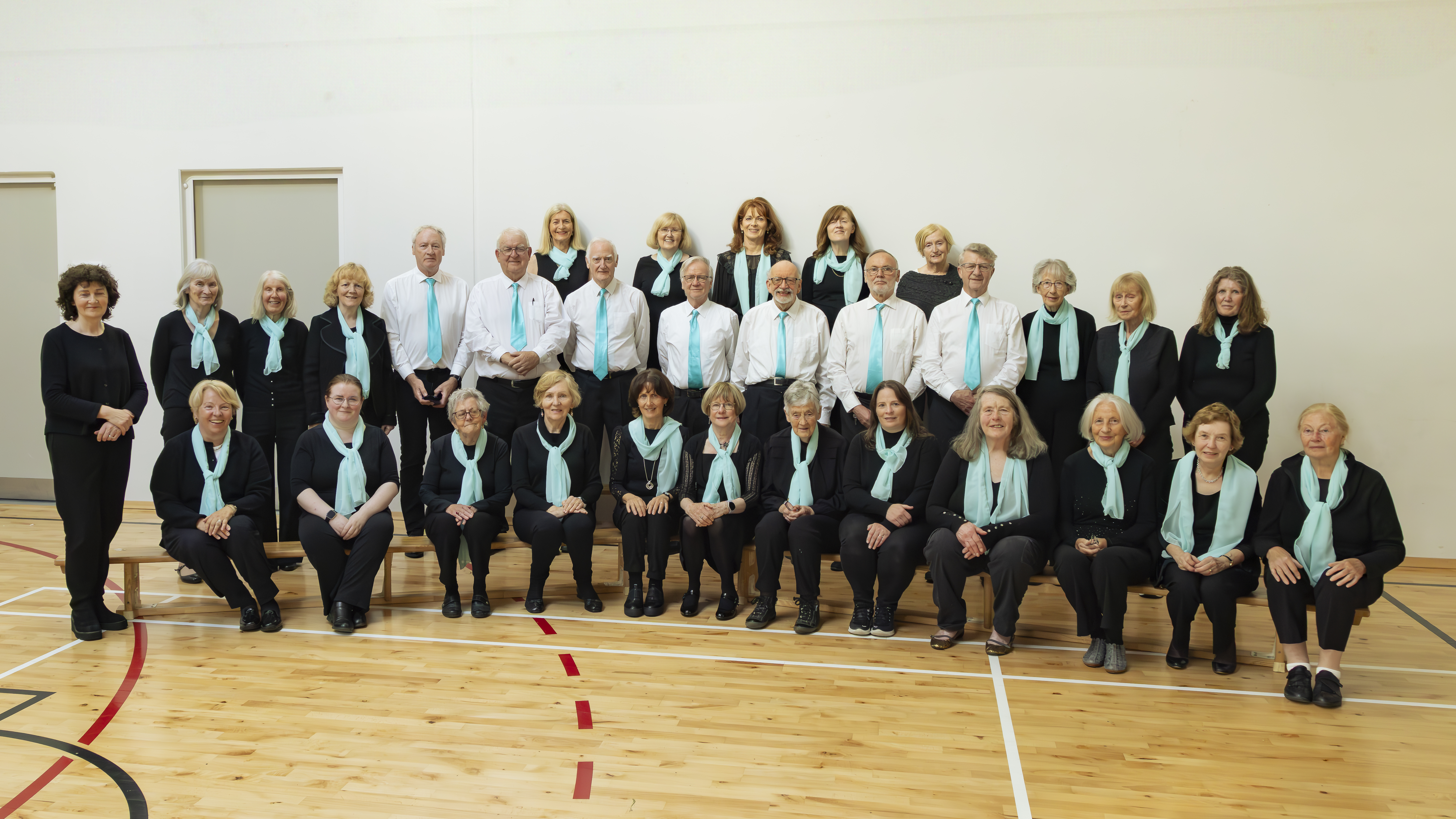 A picture of a large choir called As Beal a Cheile