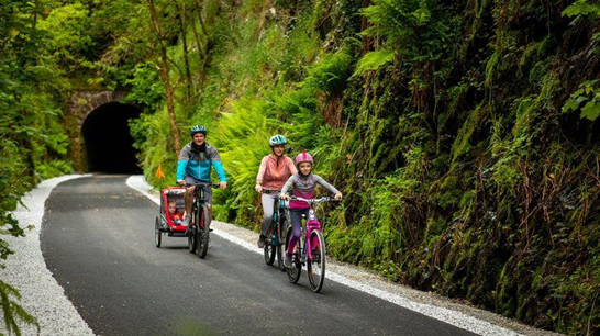 3 people cycling 