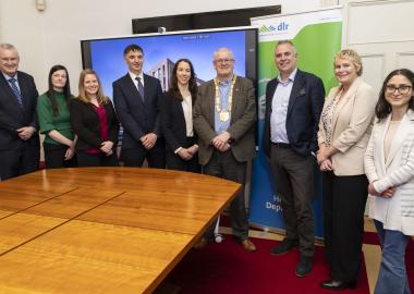 An photograph of An Cathaoirleach, Jim Gildea and Chief Executive Frank Curran along with staff members involved in this project