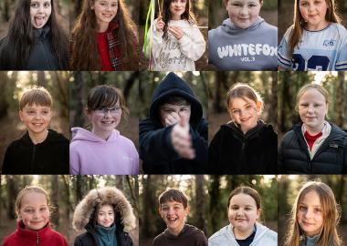 Fifteen portraits of young children in a woodland area arranged in a grid