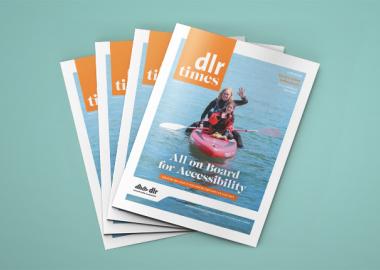 Front cover of dlr Times with young woman and girl on kayak