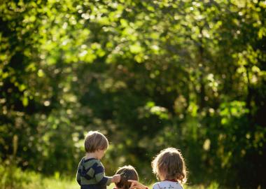 3 kids on a nature walk 