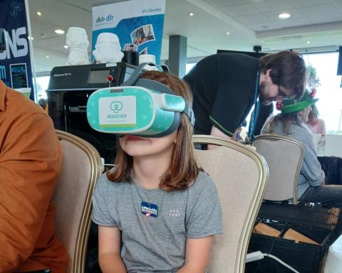 A young girl wearing a vr headset