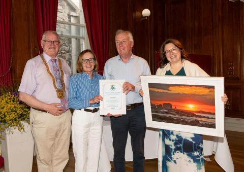 Cathaoirleach, Chairperson with awarding recipient 