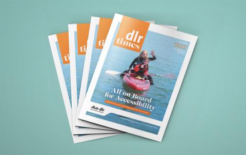 Front cover of dlr Times with young woman and girl on kayak