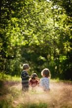 3 kids on a nature walk 