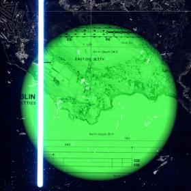 still from an animation. A bright green circle with a section of map is shown against a black background. there is a white line dividing the image one third in from the left hand side