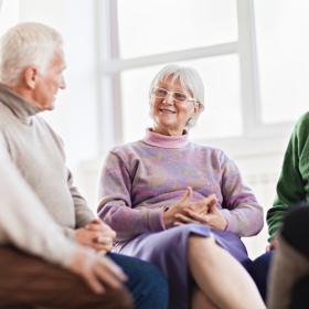 Stock image of older people talking