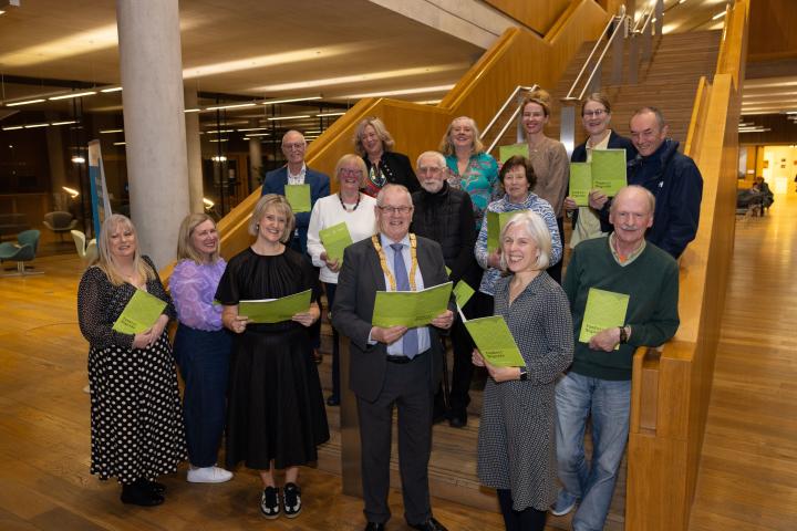 The playwrights showing their latest publication Fondest Regards, standing at the main stairs in dlr LexIcon.