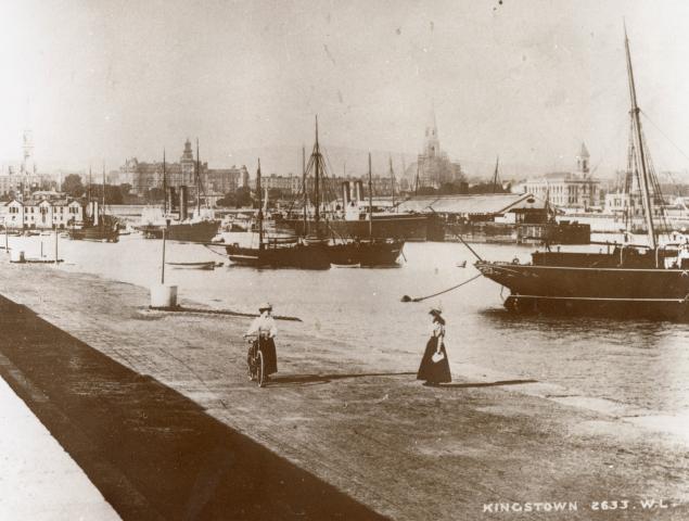 Historic photo of women walking on the Dún Laoghaire East Pier