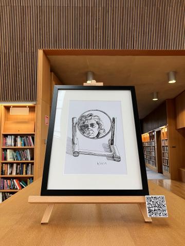 Self portrait drawing in a round mirror. drawing is in a black frame on an easel on top of a library bookshelf
