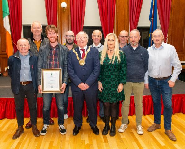 Councillor Denis O’Callaghan, Cathaoirleach of Dún Laoghaire-Rathdown County Council with staff from the Blackrock Postal Delivery Office.
