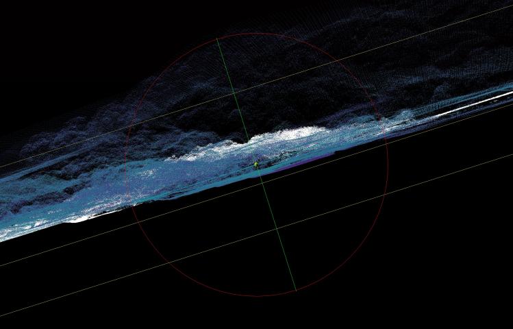 this is a research image from artist Martina O'Brien. The horizon is tilted down to the left, the bottom half of the image is completely black. The top half is a blurry mix of blue, purple and white. some yellow lines run from left to right at an angel over the image and a thin outline of a circle in red is in the centre