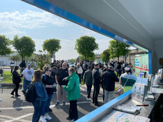 Cruise guests welcomed by welcome staff to orientate guests