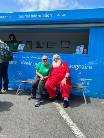 Guests enjoying the sun &amp; sitting down for a chat with welcome staff.