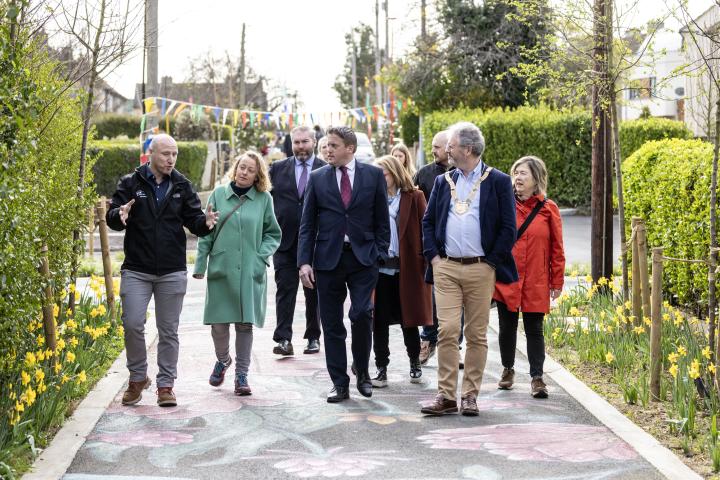 group of people walking and discussing