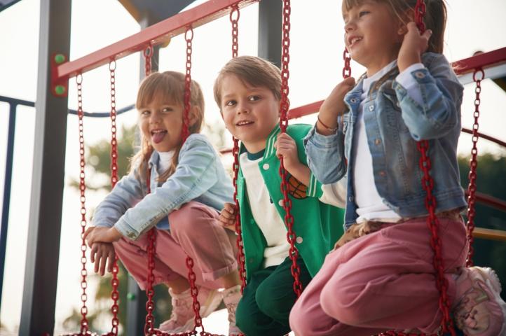 Girl and Boys at Playground