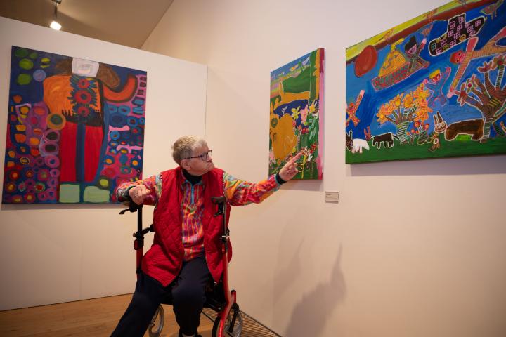 Artist Lorna Corrigan with her artworks at the opening of Lifework Exhibition at dlr LexIcon
