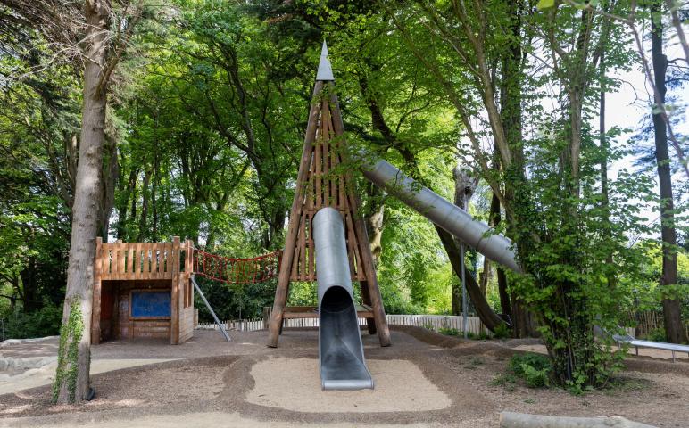 Playground slide and hut