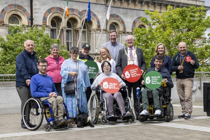 A group photo of dlr staff and members of the DCG standing outside the County Hall in Dun Laoghaire