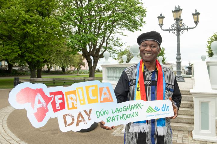 Pierrot Ngadi,holding Africa Day logo