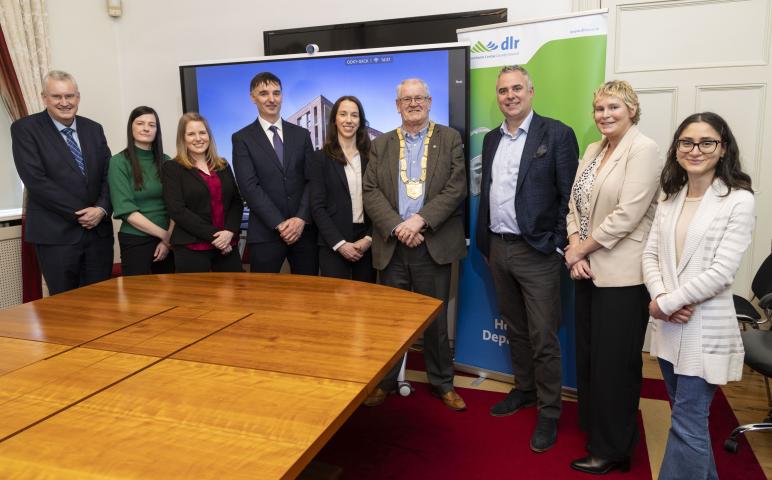 An photograph of An Cathaoirleach, Jim Gildea and Chief Executive Frank Curran along with staff members involved in this project