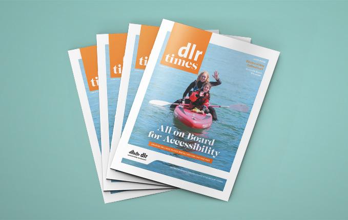 Front cover of dlr Times with young woman and girl on kayak
