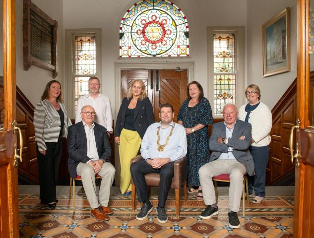 Back row - Deirdre Baber (Director of Community, Cultural Services &amp; Parks), Padraic Hurley (Pride of Place), Anne Devine (Deputy Chief Executive), Sandra Kelly (Senior Community Officer of Culture and Parks) and Mary Ruane (Senior Executive Officer of Community, Cultural Services &amp; Parks). Front row - Brendan McGrath (Judge), An Cathaoirleach Cllr Barry Saul, and Tim Caffery (Judge).