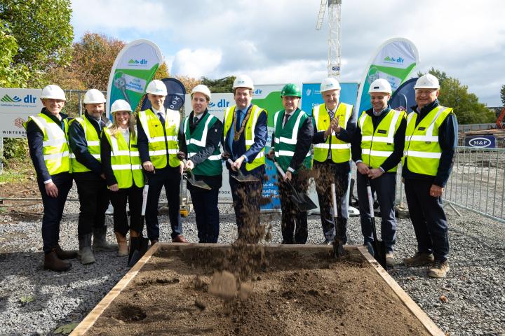 Group image on constuction site of Michael Kissane, Finance Director,  Winterbrook Ltd., Paul Farrell, Construction Director, Winterbrook Ltd., Anne-Marie Drohan, Operations Director, Winterbrook Ltd., Gerard O’Sullivan, Director of Housing, DLR, John Cummins T.D., Minister of State, Barry Saul, Cathaoirleach, DLR, James Browne T.D., Minister for Housing, Local Government and Heritage, Frank Curran, Chief Executive, DLR, Conor Rhatigan, Managing Director, Winterbrook Ltd., Francis Rhatigan, Director, Winter