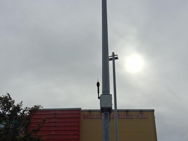 Photograph of a noise quality monitoring system installed at a location in dlr