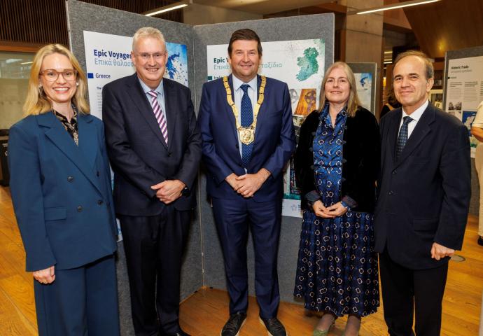 Ms Ciara O'Floinn, Ambassador of Ireland to Greece, Frank Curran, Chief Executive of Dún Laoghaire-Rathdown County Council, Cllr Barry Saul, An Cathaoirleach of Dún Laoghaire-Rathdown County Council, Catherine Gallagher, County Librarian, Mr Georgius Stilianopoulos, Ambassador of Greece to Ireland standing infornt of exhibition disply