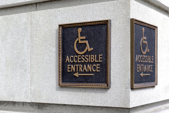 Accessible entrance sign
