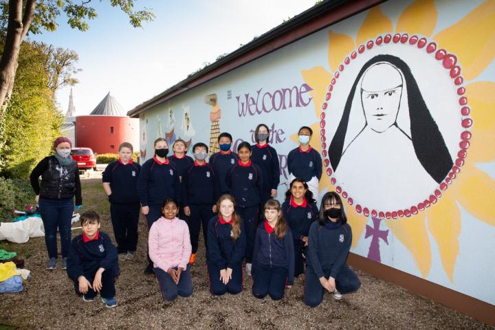Mags Harnett and 6th class Dominican Primary School
