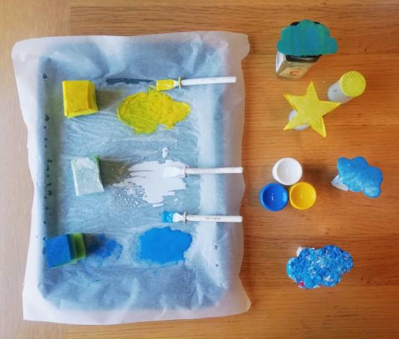 Image of paint palette and homemade stamps