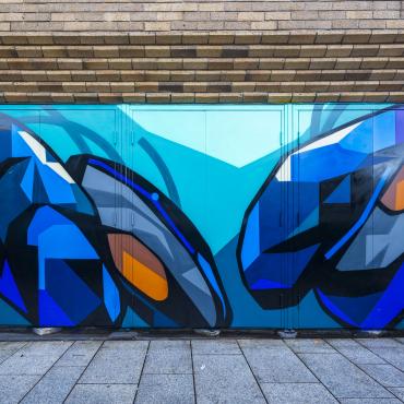 Oysters on side door of DL Shopping Centre, mural by Dan Leo